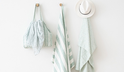 Linen holiday essentials arranged for summer travel