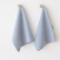 Blue striped Jazz linen tea towels hanging on wall hooks