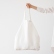 Off-white Terra linen shopping bag held by hand